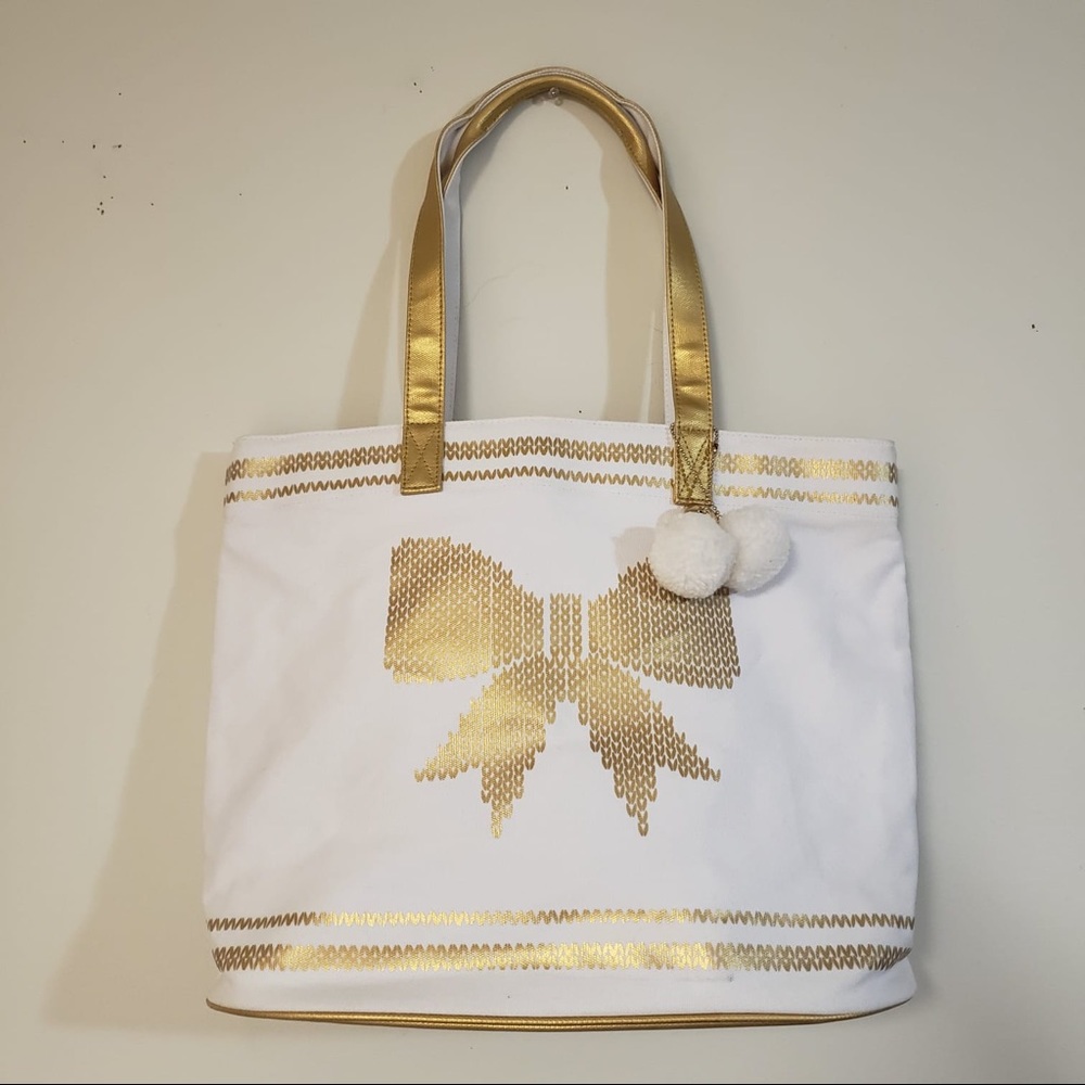 NWOT Punctuate B & N exclusive gold white bow bag